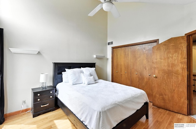 2108 S 62nd St, Omaha, NE 68106 - bedroom with a high ceiling, wood finished floors, a closet, and ceiling fan