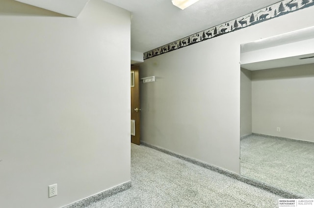 2108 S 62nd St, Omaha, NE 68106 - hallway featuring carpet and baseboards