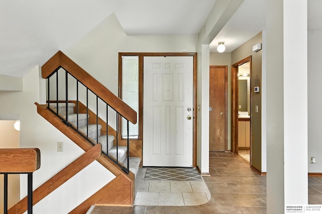 2108 S 62nd St, Omaha, NE 68106 - entryway featuring baseboards and stairs