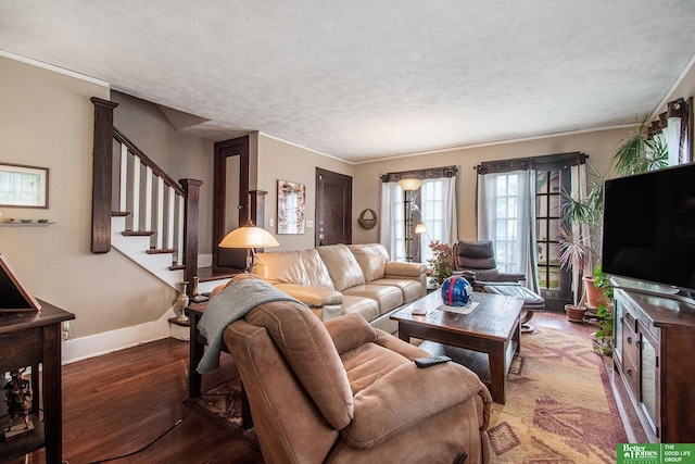 1100/1102 S 35th Ave, Omaha, NE 68105 - living area with a textured ceiling, wood finished floors, stairway, and ornamental molding