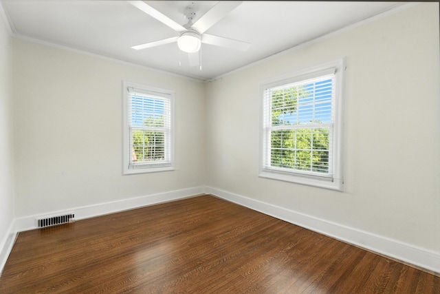 2525 N 55th St, Omaha, NE 68104 - unfurnished room with ornamental molding, dark wood-type flooring, and ceiling fan