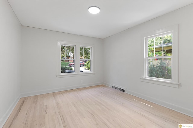 2518 N 56th St, Omaha, NE 68104 - spare room with light wood-style flooring and baseboards
