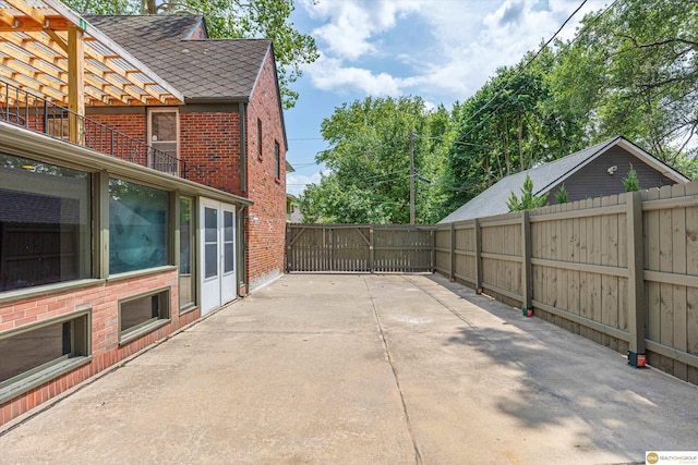 2518 N 56th St, Omaha, NE 68104 - fenced backyard with a patio area
