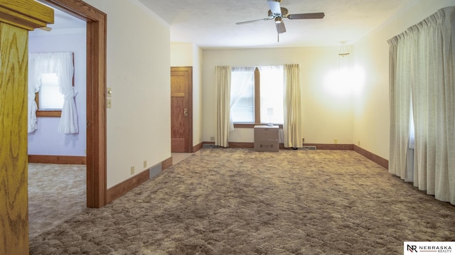 590 Tyler St, Bennet, NE 68317 - spare room featuring ceiling fan and carpet floors