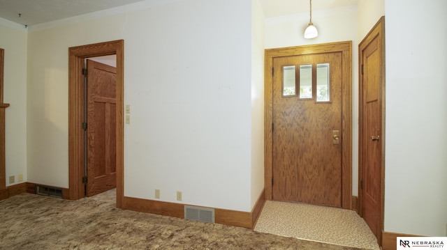 590 Tyler St, Bennet, NE 68317 - entryway featuring carpet and baseboards