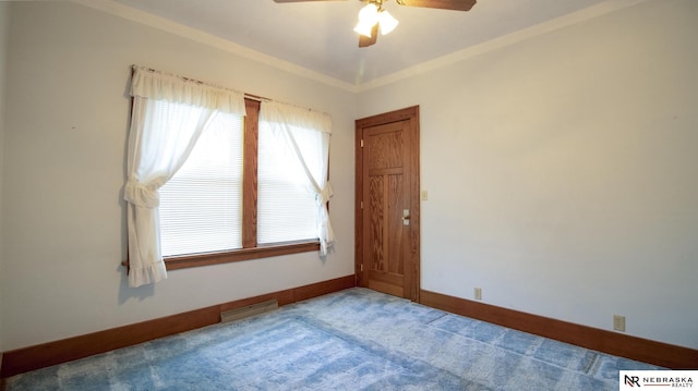 590 Tyler St, Bennet, NE 68317 - empty room with ceiling fan and carpet flooring