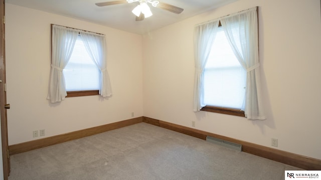 590 Tyler St, Bennet, NE 68317 - empty room with a ceiling fan and carpet
