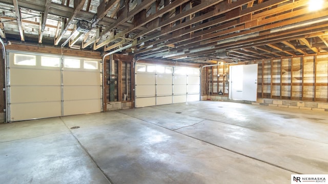 590 Tyler St, Bennet, NE 68317 - garage with a garage door opener