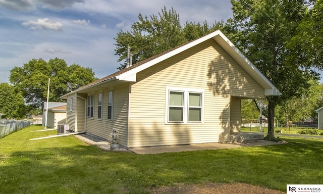 590 Tyler St, Bennet, NE 68317 - view of side of property with a central AC unit