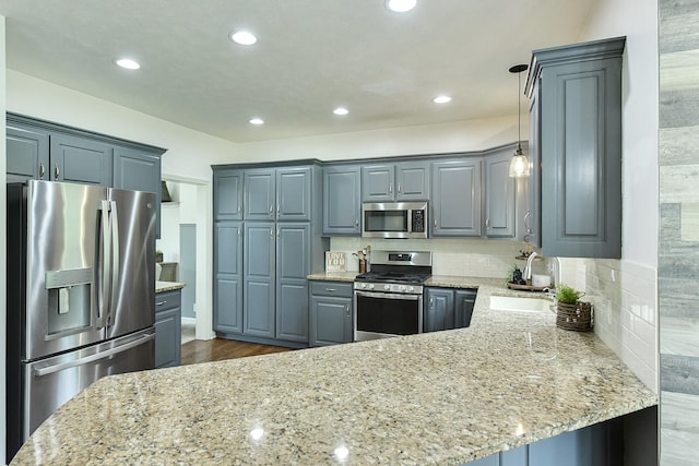 1622 S 179th St, Omaha, NE 68130 - kitchen with stainless steel appliances, light stone countertops, recessed lighting, backsplash, and dark wood-style floors
