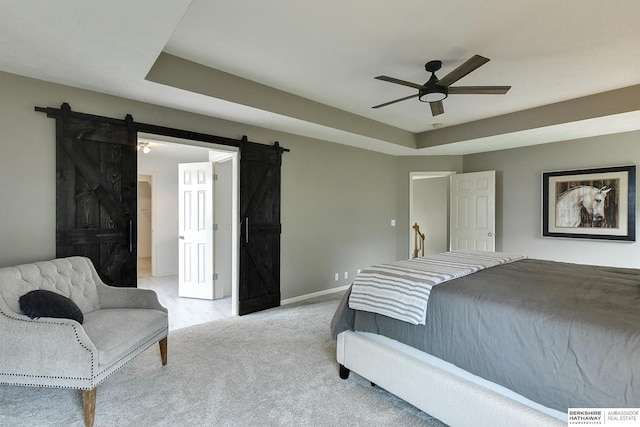 1622 S 179th St, Omaha, NE 68130 - bedroom featuring a barn door, light carpet, and ceiling fan