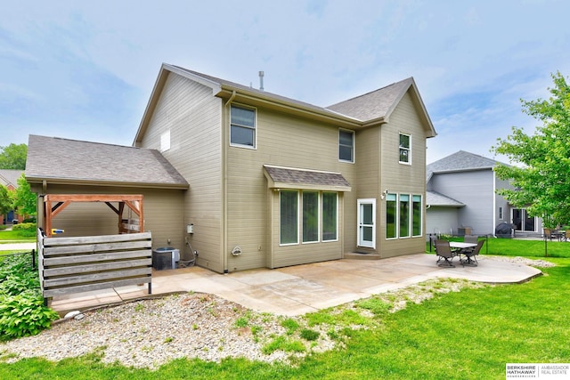 1622 S 179th St, Omaha, NE 68130 - back of property featuring a patio and a lawn