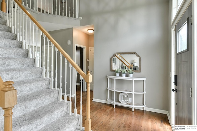 1622 S 179th St, Omaha, NE 68130 - entrance foyer with stairway, wood finished floors, and a high ceiling