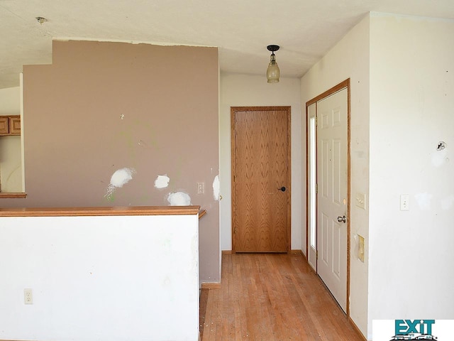 9105 Olive Creek Rd, Hickman, NE 68372 - corridor featuring light wood-style flooring