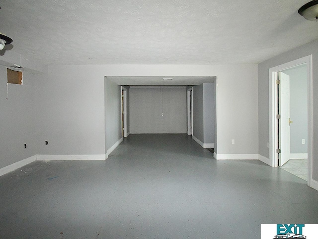 9105 Olive Creek Rd, Hickman, NE 68372 - spare room featuring baseboards and a textured ceiling