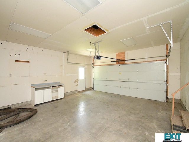 9105 Olive Creek Rd, Hickman, NE 68372 - garage featuring a garage door opener