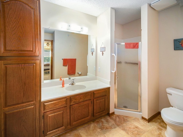 2425 Folkways Blvd Unit 211, Lincoln, NE 68521 - full bathroom featuring vanity, a shower stall, and a textured ceiling