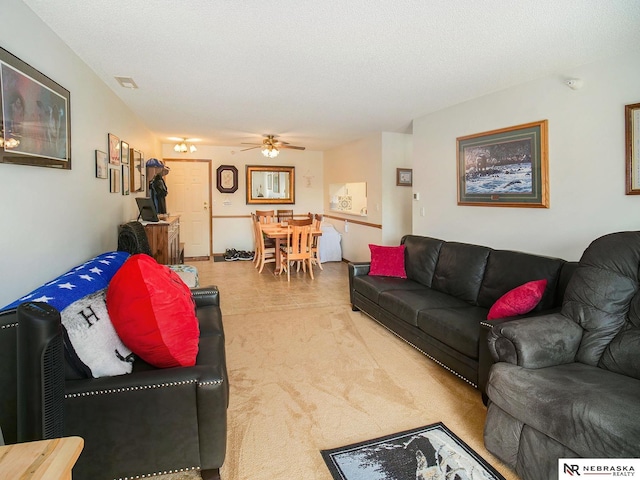2425 Folkways Blvd Unit 211, Lincoln, NE 68521 - carpeted living room featuring a ceiling fan