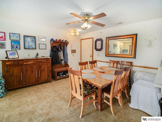 2425 Folkways Blvd Unit 211, Lincoln, NE 68521 - dining space with a ceiling fan, a textured ceiling, and light tile patterned floors