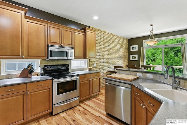 408 S 197th St, Omaha, NE 68022 - kitchen with appliances with stainless steel finishes, decorative backsplash, dark countertops, and recessed lighting