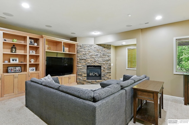 408 S 197th St, Omaha, NE 68022 - living room featuring light colored carpet, a fireplace, and recessed lighting