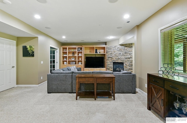 408 S 197th St, Omaha, NE 68022 - living area featuring light carpet, a stone fireplace, and recessed lighting