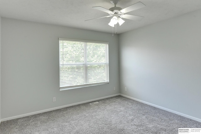 16332 Patrick Ave, Omaha, NE 68116 - carpeted spare room featuring a ceiling fan and baseboards