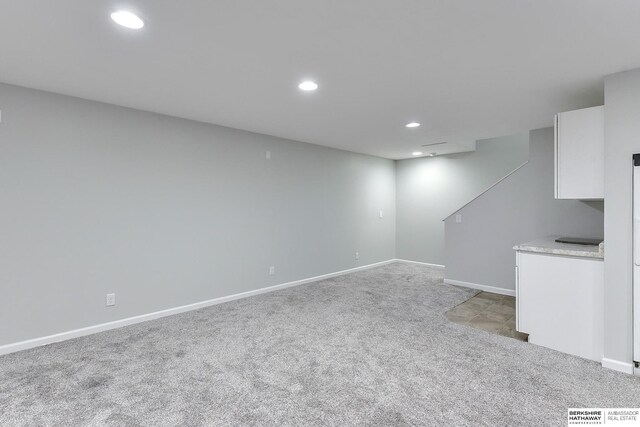 16332 Patrick Ave, Omaha, NE 68116 - finished below grade area featuring light colored carpet and recessed lighting