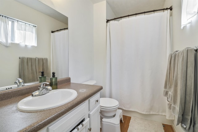 155 Vince Dr, Bennet, NE 68317 - full bathroom with vanity and wood finished floors