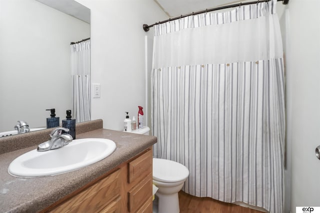 155 Vince Dr, Bennet, NE 68317 - bathroom featuring vanity, wood finished floors, and a shower with curtain
