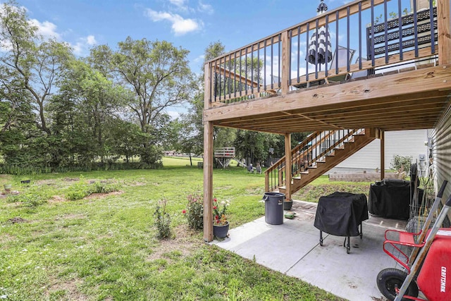 155 Vince Dr, Bennet, NE 68317 - view of grassy yard featuring a patio area, stairs, and a deck