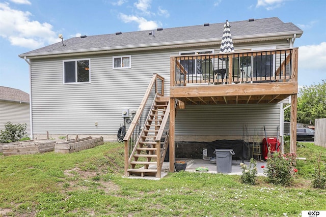 155 Vince Dr, Bennet, NE 68317 - rear view of property featuring a lawn, a wooden deck, a patio area, and a garden