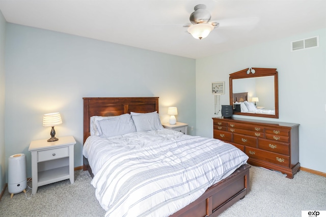 155 Vince Dr, Bennet, NE 68317 - bedroom with light colored carpet and a ceiling fan