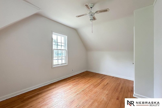3340 N 48th Ave, Omaha, NE 68104 - additional living space featuring a ceiling fan, vaulted ceiling, and light wood-style flooring