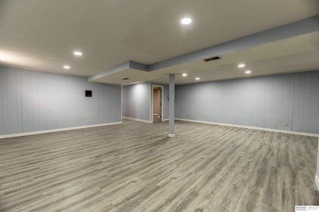 3701 Groves Rd, Bellevue, NE 68147 - finished basement with wood finished floors and recessed lighting