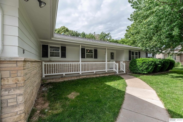 3701 Groves Rd, Bellevue, NE 68147 - single story home with a porch and a front lawn