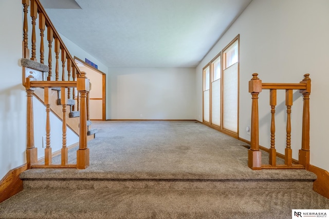 12312 Decatur St, Omaha, NE 68154 - empty room featuring carpet and stairs
