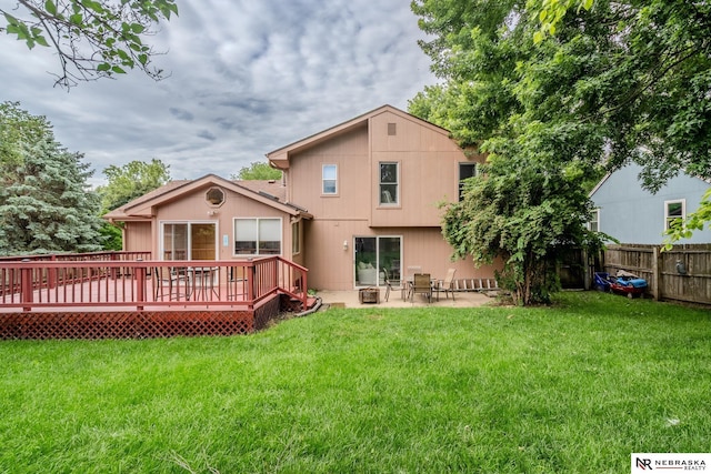 12312 Decatur St, Omaha, NE 68154 - back of property with a deck and a patio area