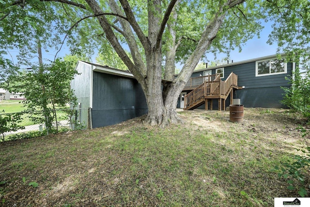 1107 N 6th St, Nebraska City, NE 68410 - back of property featuring stairway and a deck