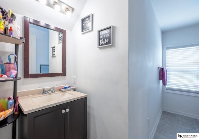 2567 Marcy St, Omaha, NE 68105 - bathroom with vanity and tile patterned flooring