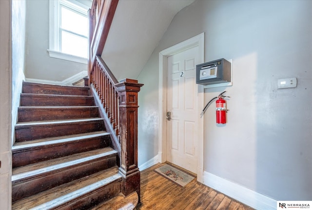 2567 Marcy St, Omaha, NE 68105 - stairway with wood finished floors and vaulted ceiling