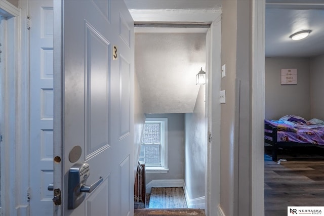 2567 Marcy St, Omaha, NE 68105 - hallway featuring wood finished floors and baseboards