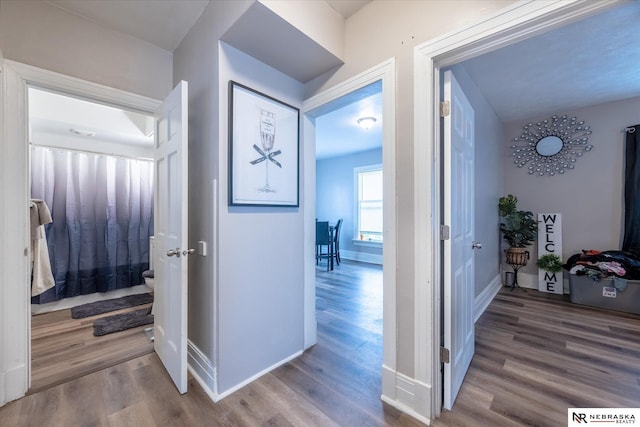 2567 Marcy St, Omaha, NE 68105 - hallway with wood finished floors and baseboards
