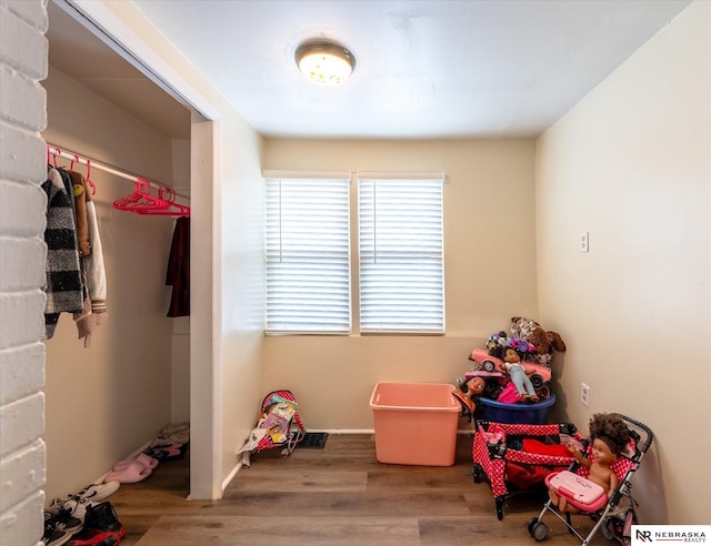 2567 Marcy St, Omaha, NE 68105 - rec room with wood finished floors