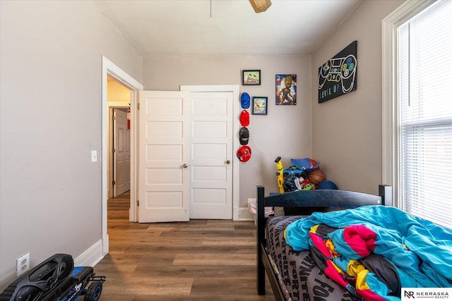 2567 Marcy St, Omaha, NE 68105 - bedroom with wood finished floors and a ceiling fan
