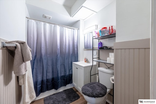 2567 Marcy St, Omaha, NE 68105 - full bath featuring a sink and wood finished floors