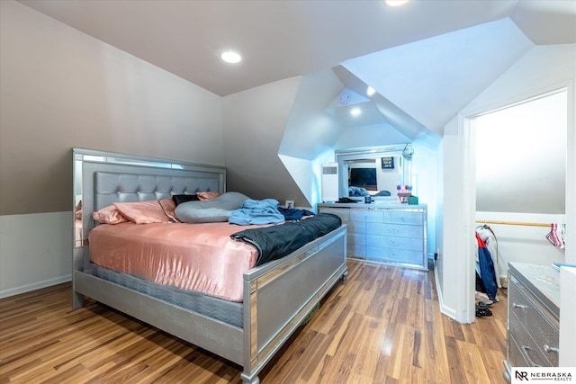 2567 Marcy St, Omaha, NE 68105 - bedroom with lofted ceiling, wood finished floors, and recessed lighting