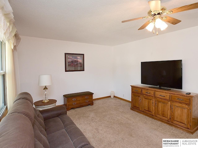 5511 S 104th Cir, Omaha, NE 68127 - living room featuring light colored carpet and ceiling fan
