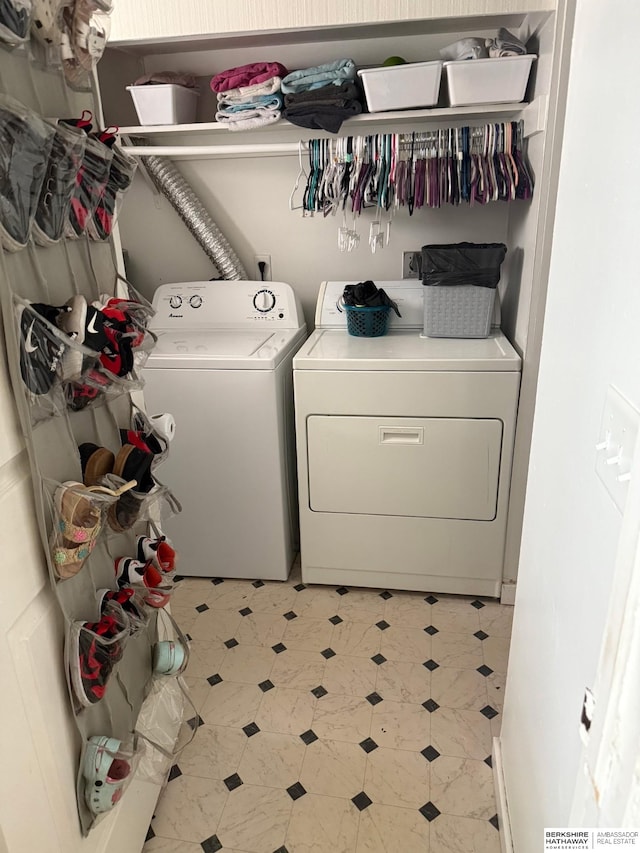 5125 Marshall Dr, Omaha, NE 68137 - laundry area with washing machine and clothes dryer and light floors