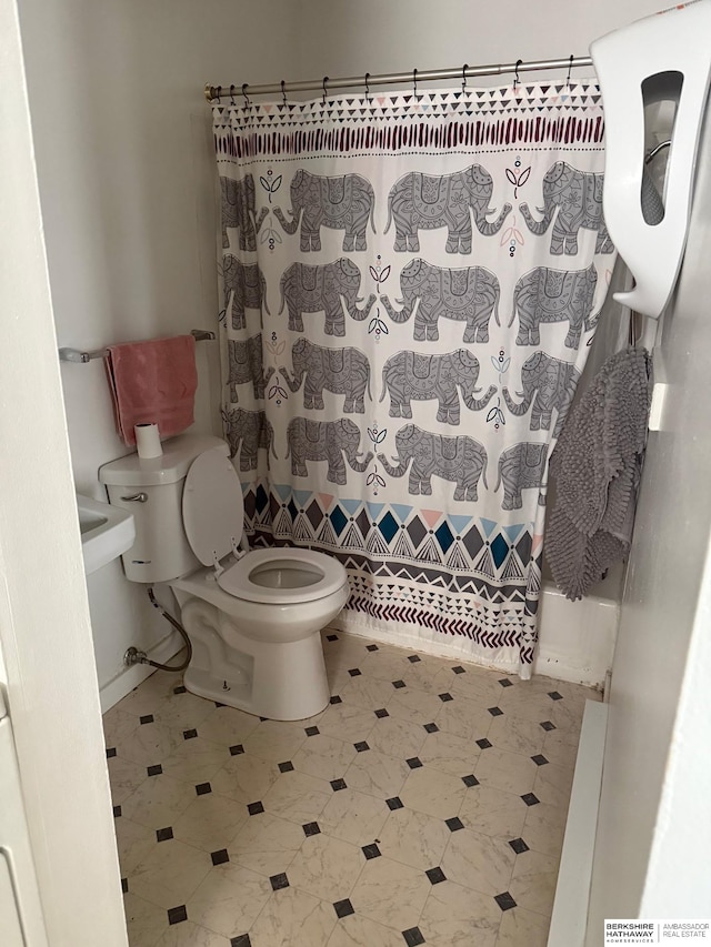5125 Marshall Dr, Omaha, NE 68137 - full bathroom featuring toilet and curtained shower
